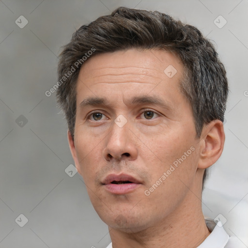 Neutral white adult male with short  brown hair and brown eyes