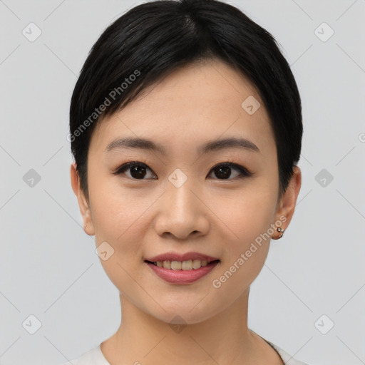 Joyful asian young-adult female with short  black hair and brown eyes