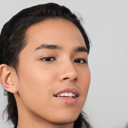 Joyful white young-adult male with medium  black hair and brown eyes