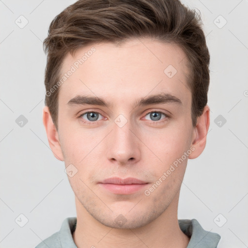 Neutral white young-adult male with short  brown hair and grey eyes