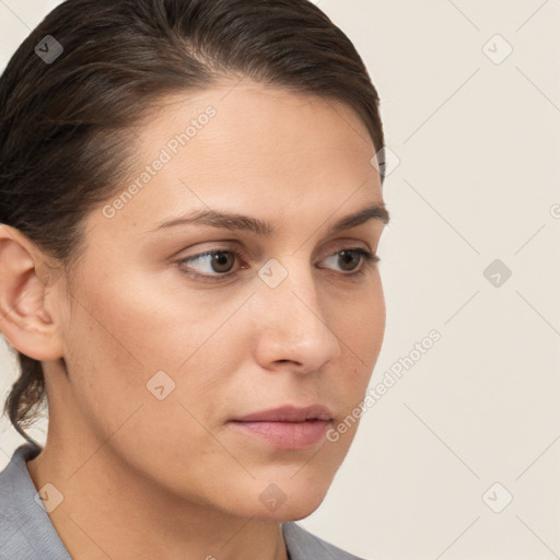 Neutral white young-adult female with short  brown hair and brown eyes