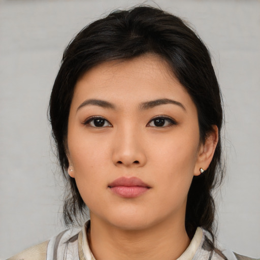 Neutral asian young-adult female with medium  black hair and brown eyes