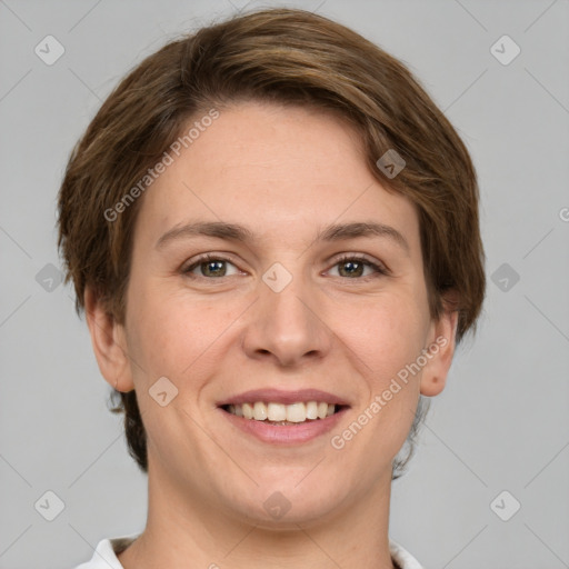 Joyful white young-adult female with short  brown hair and grey eyes