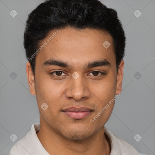 Joyful latino young-adult male with short  black hair and brown eyes