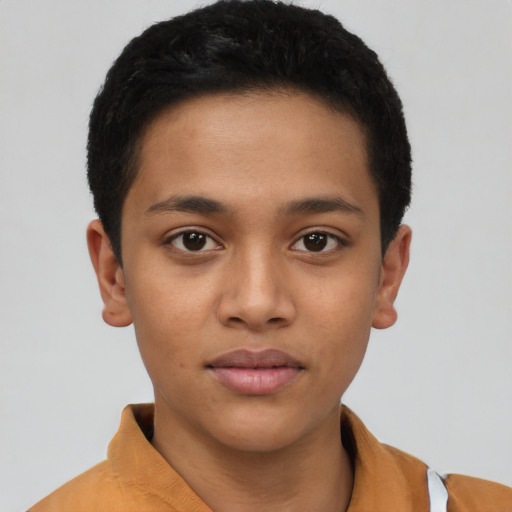 Joyful latino young-adult male with short  brown hair and brown eyes