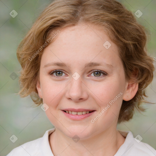 Joyful white young-adult female with medium  brown hair and blue eyes