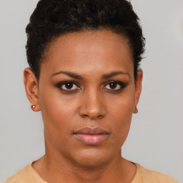 Neutral black young-adult female with short  brown hair and brown eyes