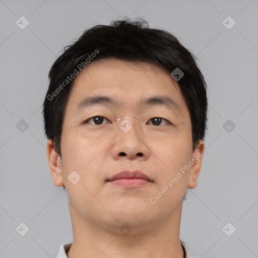 Neutral asian adult male with short  brown hair and brown eyes