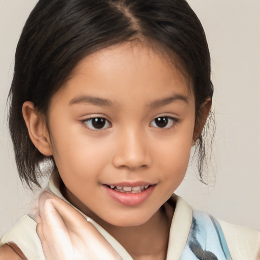 Joyful white child female with medium  brown hair and brown eyes