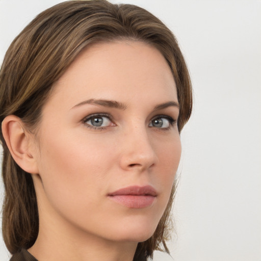 Neutral white young-adult female with long  brown hair and grey eyes