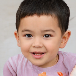 Joyful white child male with short  brown hair and brown eyes