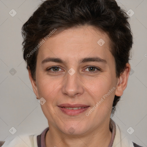 Joyful white adult female with short  brown hair and brown eyes