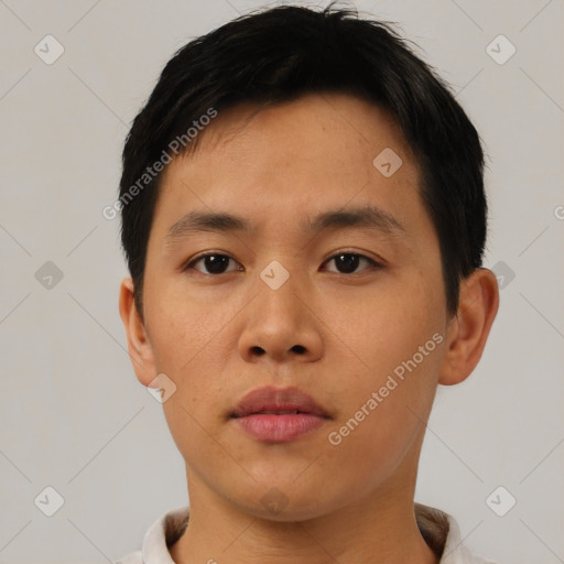 Neutral asian young-adult male with short  brown hair and brown eyes