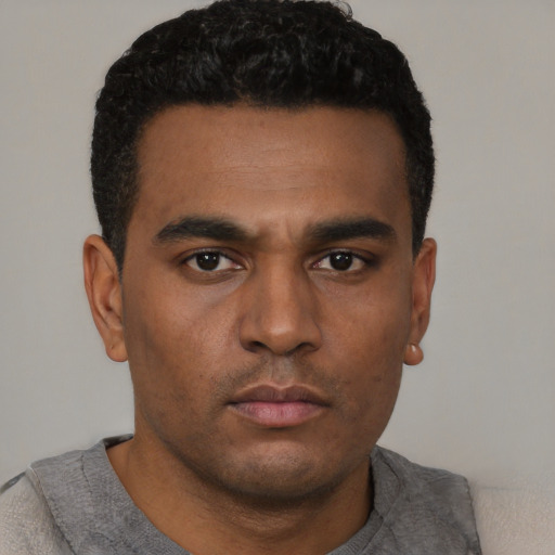 Neutral black young-adult male with short  black hair and brown eyes