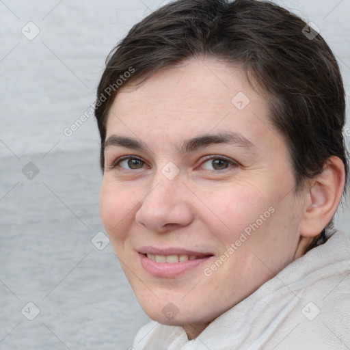 Joyful white young-adult female with short  brown hair and brown eyes