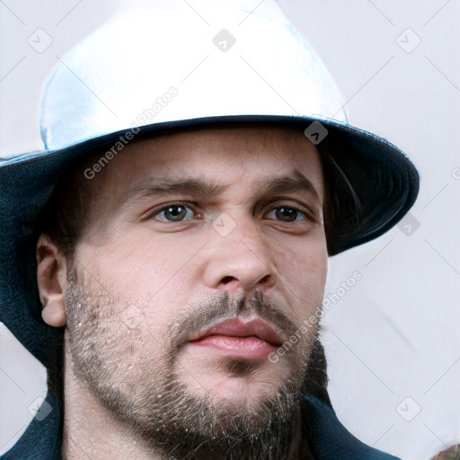 Neutral white young-adult male with short  brown hair and grey eyes