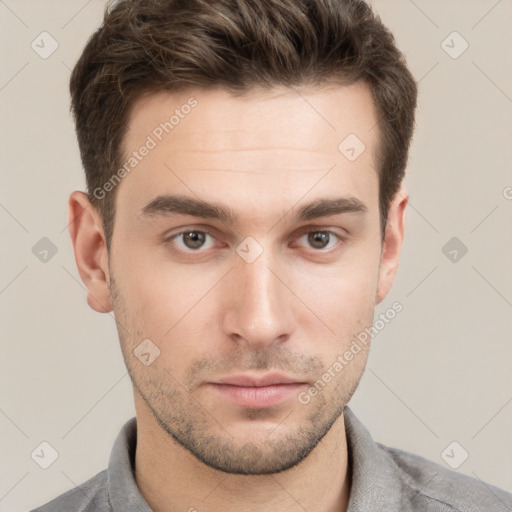 Neutral white young-adult male with short  brown hair and grey eyes