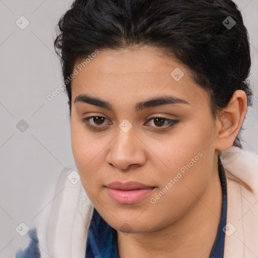 Joyful latino young-adult female with medium  brown hair and brown eyes