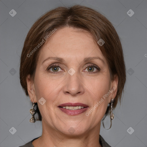 Joyful white adult female with medium  brown hair and grey eyes