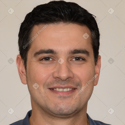 Joyful white young-adult male with short  black hair and brown eyes