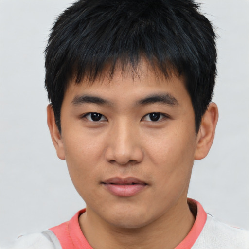 Neutral asian young-adult male with short  black hair and brown eyes