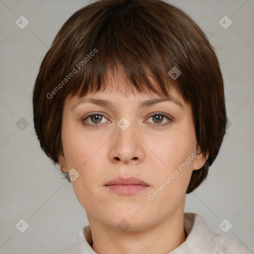 Neutral white young-adult female with short  brown hair and brown eyes