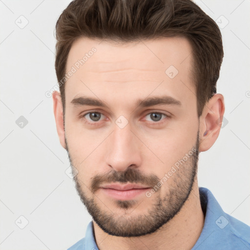 Neutral white young-adult male with short  brown hair and grey eyes