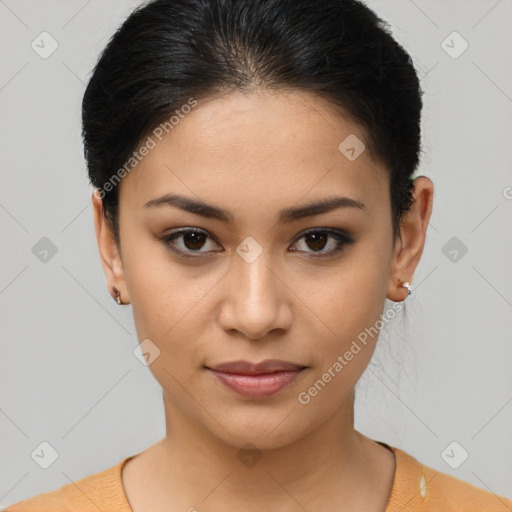 Joyful latino young-adult female with short  brown hair and brown eyes