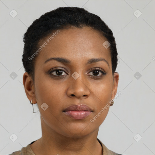 Joyful black young-adult female with short  brown hair and brown eyes