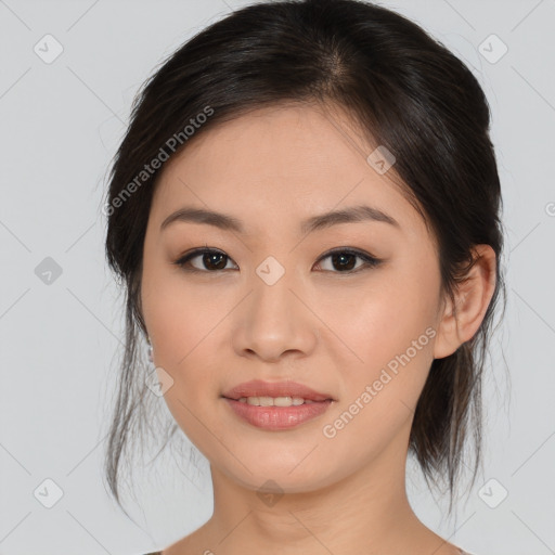 Joyful asian young-adult female with medium  brown hair and brown eyes