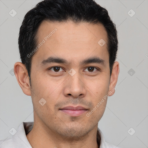 Joyful latino young-adult male with short  brown hair and brown eyes