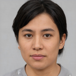 Neutral asian young-adult female with medium  brown hair and brown eyes