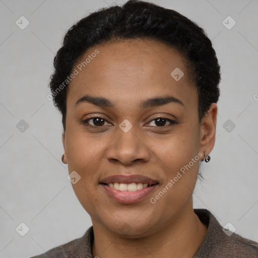 Joyful latino young-adult female with short  black hair and brown eyes