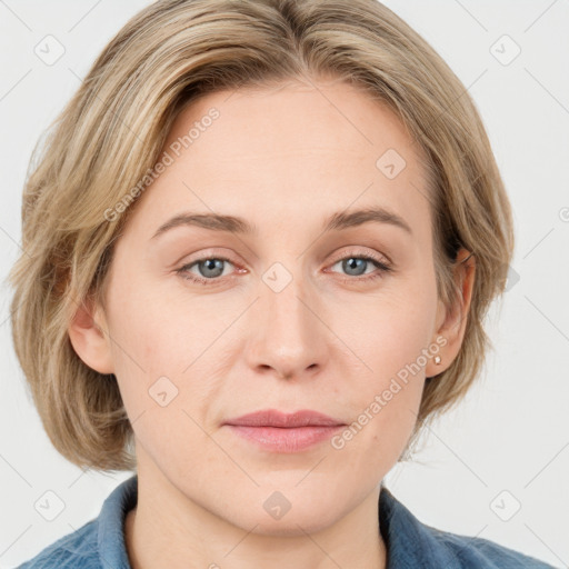 Joyful white young-adult female with medium  brown hair and blue eyes