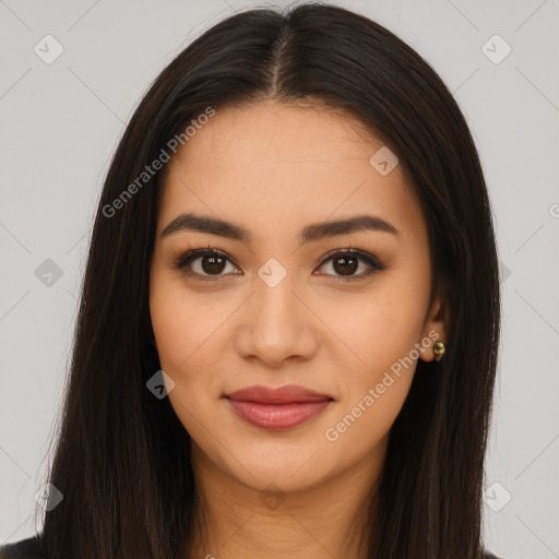 Joyful latino young-adult female with long  brown hair and brown eyes