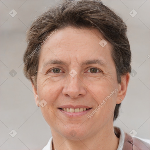 Joyful white adult female with short  brown hair and brown eyes