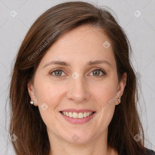 Joyful white young-adult female with long  brown hair and grey eyes