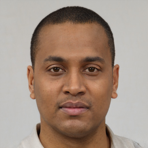Neutral black young-adult male with short  black hair and brown eyes