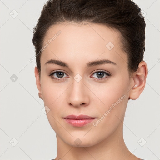 Neutral white young-adult female with short  brown hair and brown eyes