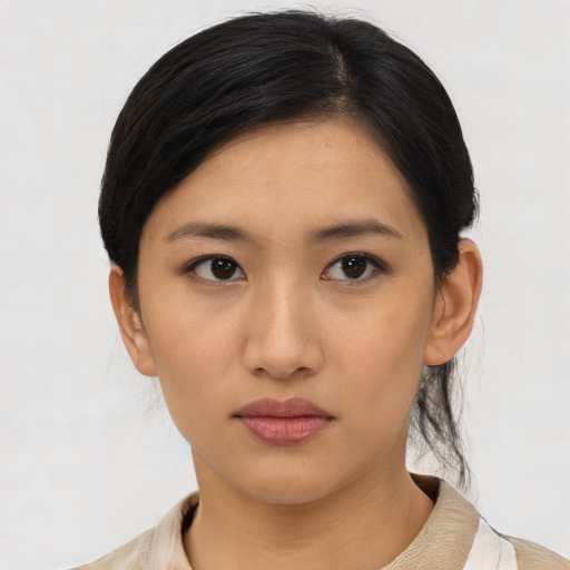 Neutral asian young-adult female with short  black hair and brown eyes