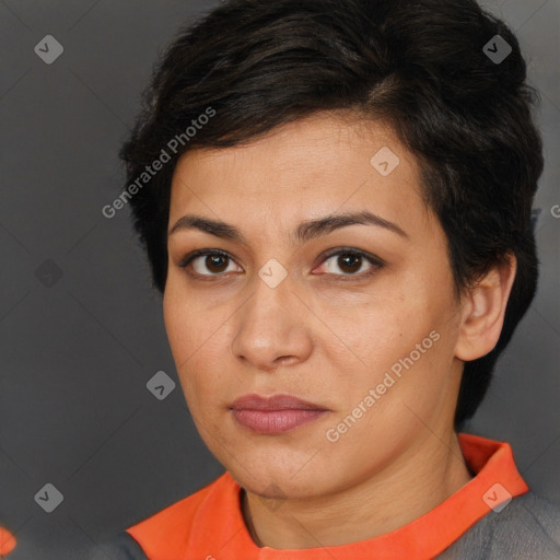 Joyful white adult female with short  brown hair and brown eyes