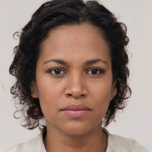 Neutral latino young-adult female with medium  brown hair and brown eyes