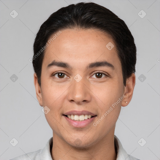 Joyful white young-adult male with short  black hair and brown eyes