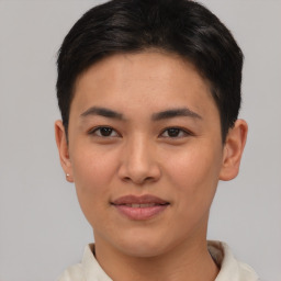 Joyful asian young-adult female with short  brown hair and brown eyes