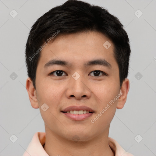 Joyful asian young-adult male with short  brown hair and brown eyes