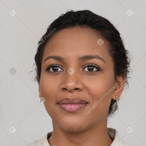 Joyful latino young-adult female with short  brown hair and brown eyes