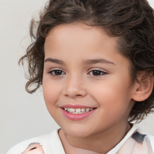 Joyful white child female with medium  brown hair and brown eyes