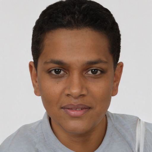 Joyful black young-adult male with short  brown hair and brown eyes