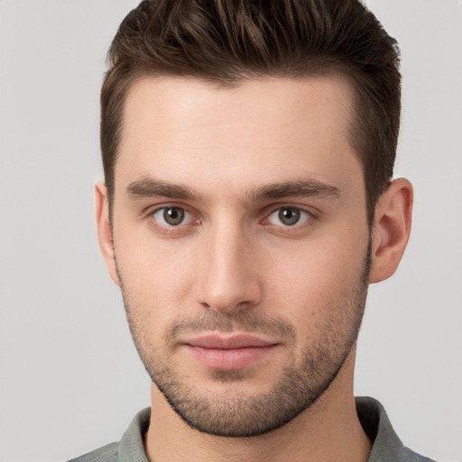 Neutral white young-adult male with short  brown hair and grey eyes