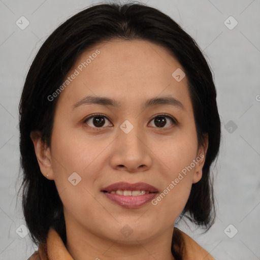 Joyful asian young-adult female with medium  brown hair and brown eyes